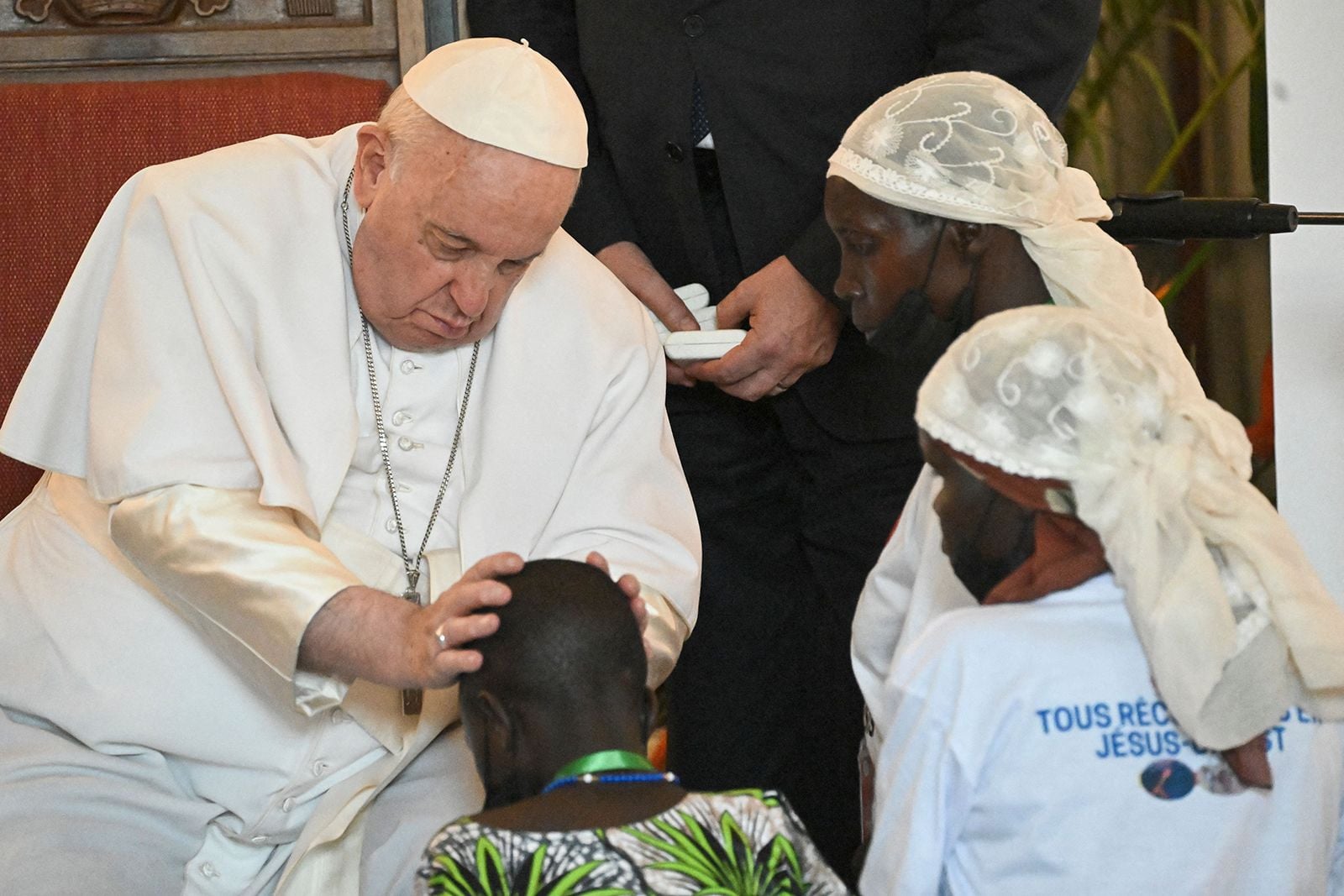 Francis blessing a child in the Democratic Republic of the Congo in 2023. © Tiziana Fabi—AFP/Getty Images
