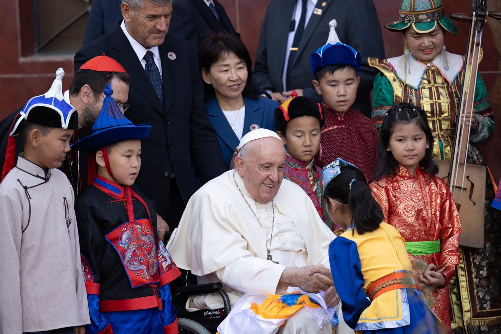 Francis greeting children in Mongolia in 2023.© Anand Tumurtogoo— AFP/Getty Images