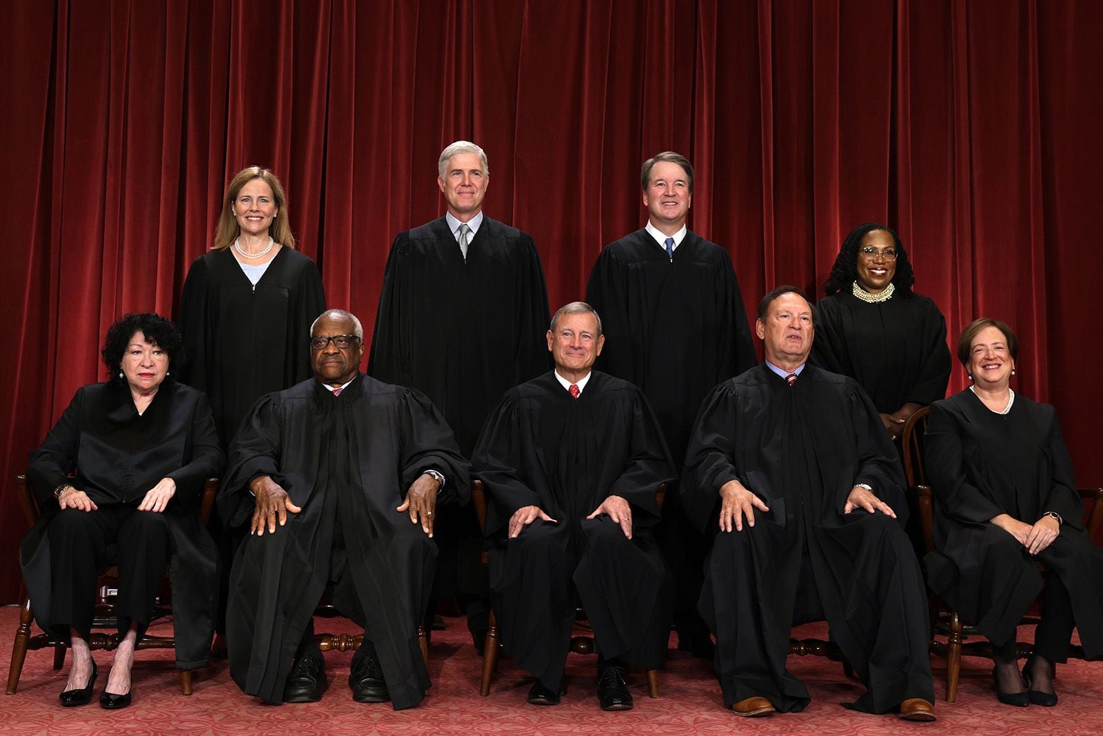 The United States Supreme Court justices pose for their official portrait in the East Conference Room of the Supreme Court building on October 7, 2022, in Washington, DC. Front row (L-R): Associate Justice Sonia Sotomayor, Associate Justice Clarence Thomas, Chief Justice John Roberts, Associate Justice Samuel Alito, and Associate Justice Elena Kagan. Back row (L-R): Associate Justice Amy Coney Barrett, Associate Justice Neil Gorsuch, Associate Justice Brett Kavanaugh, and Associate Justice Ketanji Brown Jackson.